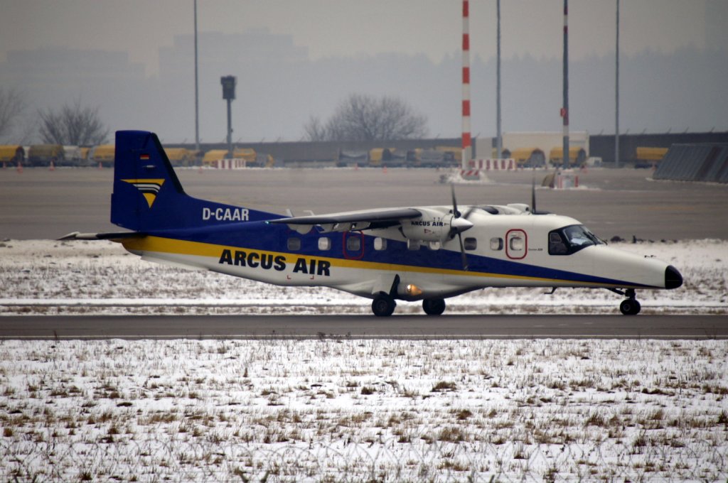 Eine Dornier 228 von Arcus Air mit der Kennung D-CAAR aufgenommen am 17.02.2010 auf dem Flughafen Stuttgart